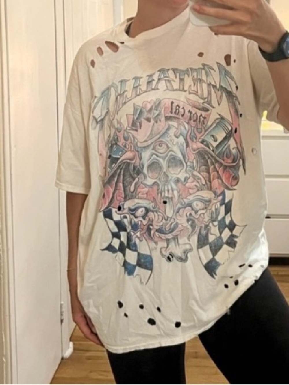 Urban Outfitters Distressed Graphic Tee.